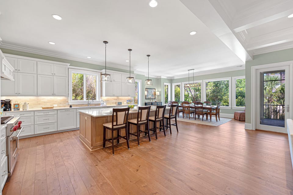 At the heart of the home is an expansive open-concept living area that blends style, comfort, and functionality.
