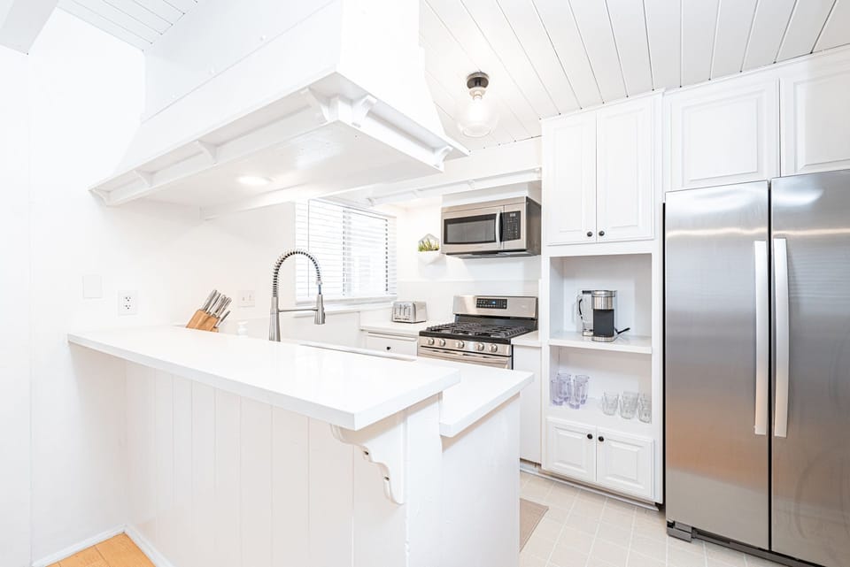 Kitchen comes stocked with dishes, utensils, cookware, bakeware, and all large and small appliances.
                