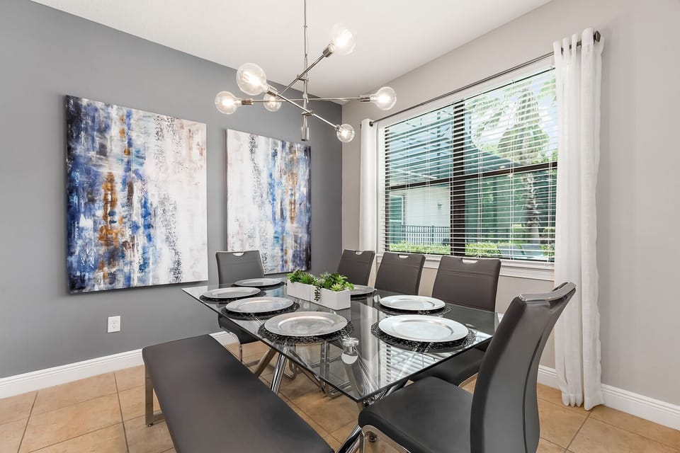 One side of the formal dining table has bench seating