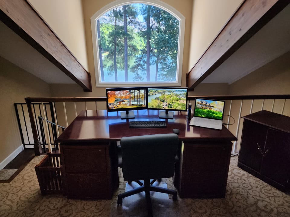 Dual monitors and docking station in home office!