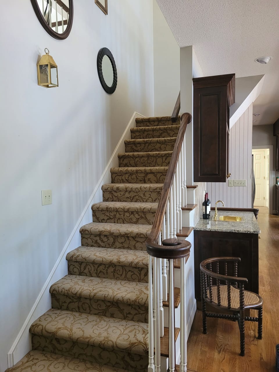 Stairs to 2 king bedrooms, each with private bathroom.