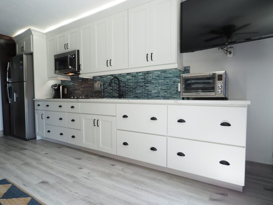 Your fully stocked kitchen. Kuerig, utensils, cutlery, dinnerware.