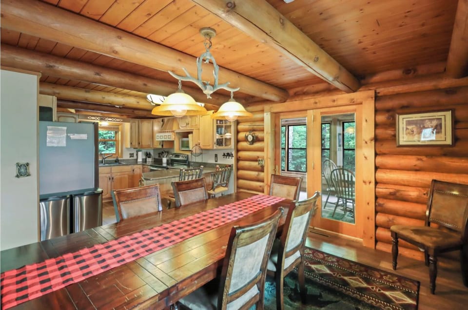 Large Dinning room table seats 8 plus 4 in the 3 seasons porch off.