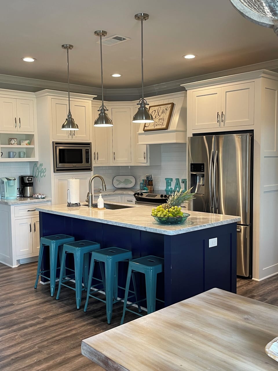 Bar seating off kitchen and near dining area 