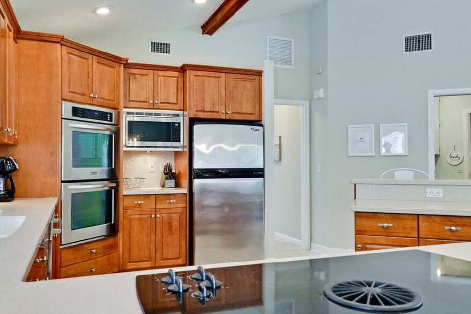 Culinary Comfort Elevated: Experience the Convenience of Our Wide and Well-Equipped Kitchen