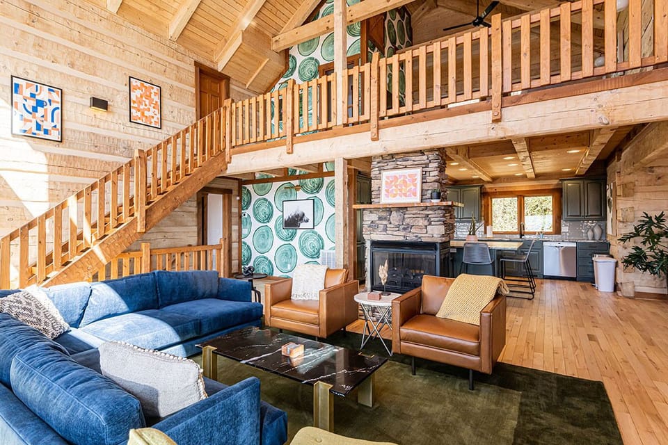 Luxuriously appointed with warm crushed velvet & saddle leather furniture.