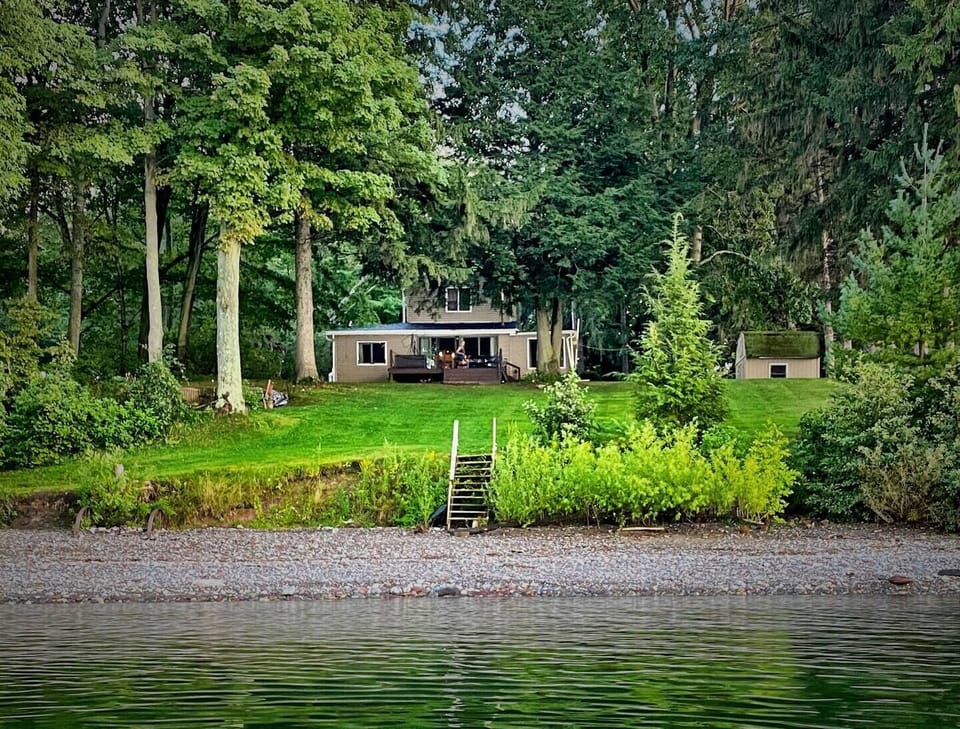Pine Beach area with lawn - small rock beach with easy access.