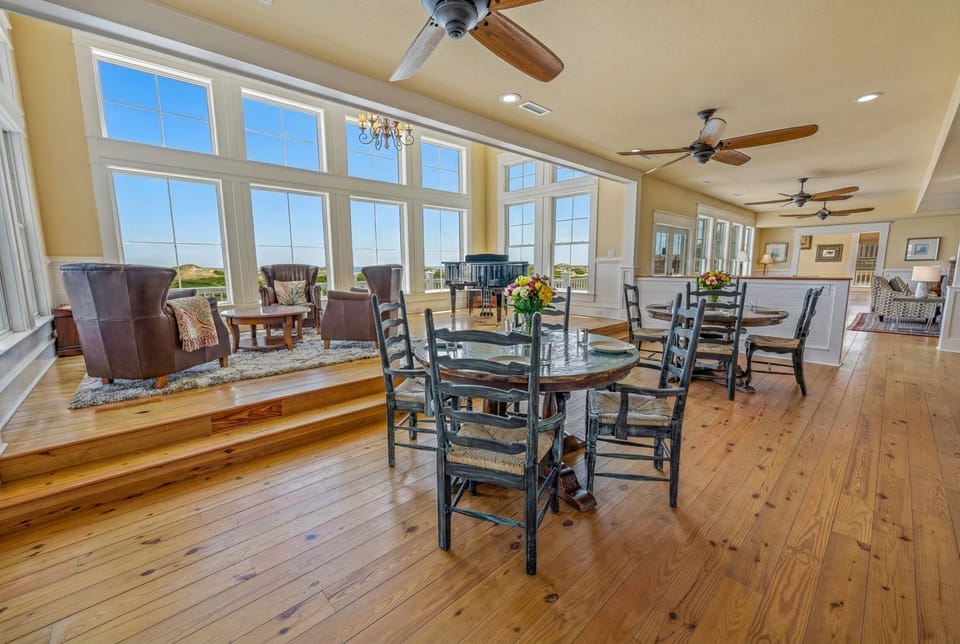 Open-Concept Living & Dining Area with Floor-to-Ceiling Ocean Views — Warm Coastal Design for Large Groups | The Mark Twain, Outer Banks