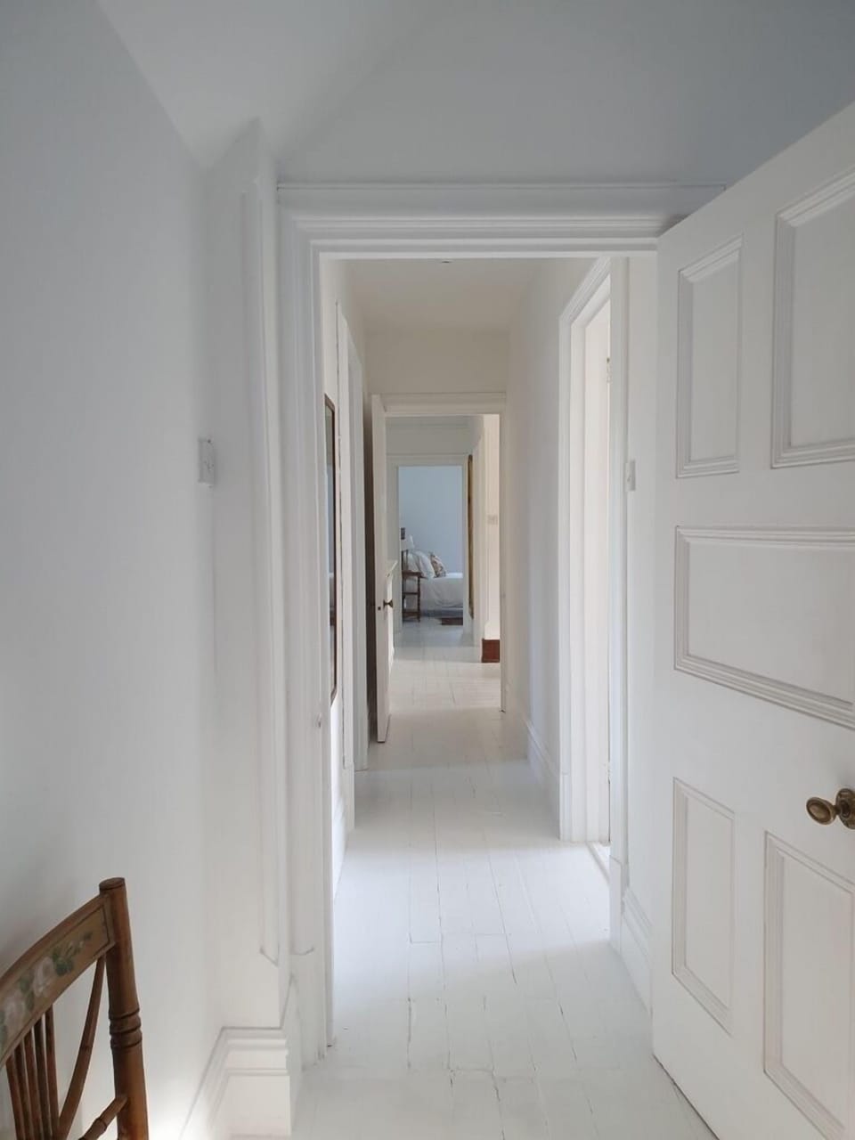 Looking down the bedroom corridor to the master bedroom