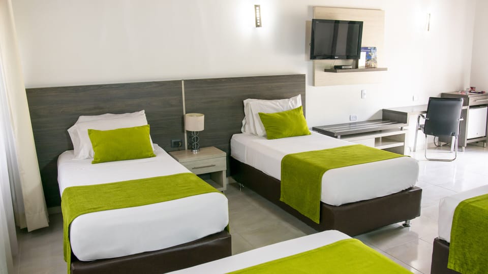 Family Room, Multiple Beds | Premium bedding, in-room safe, desk, laptop workspace