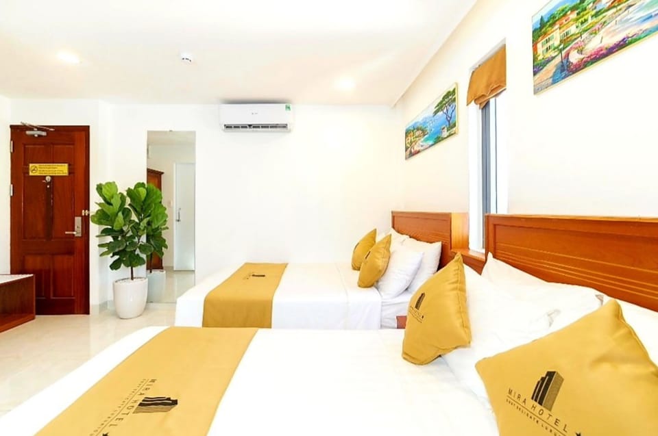 Family Room, Partial Sea View | Minibar, in-room safe, desk, blackout drapes