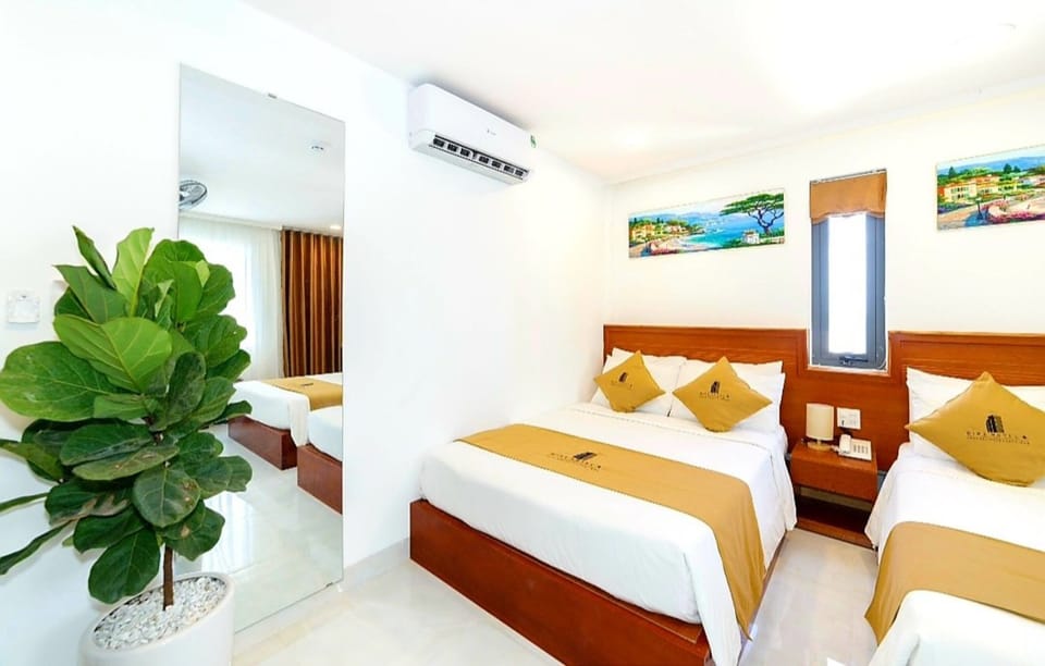 Family Room, Partial Sea View | Minibar, in-room safe, desk, blackout drapes