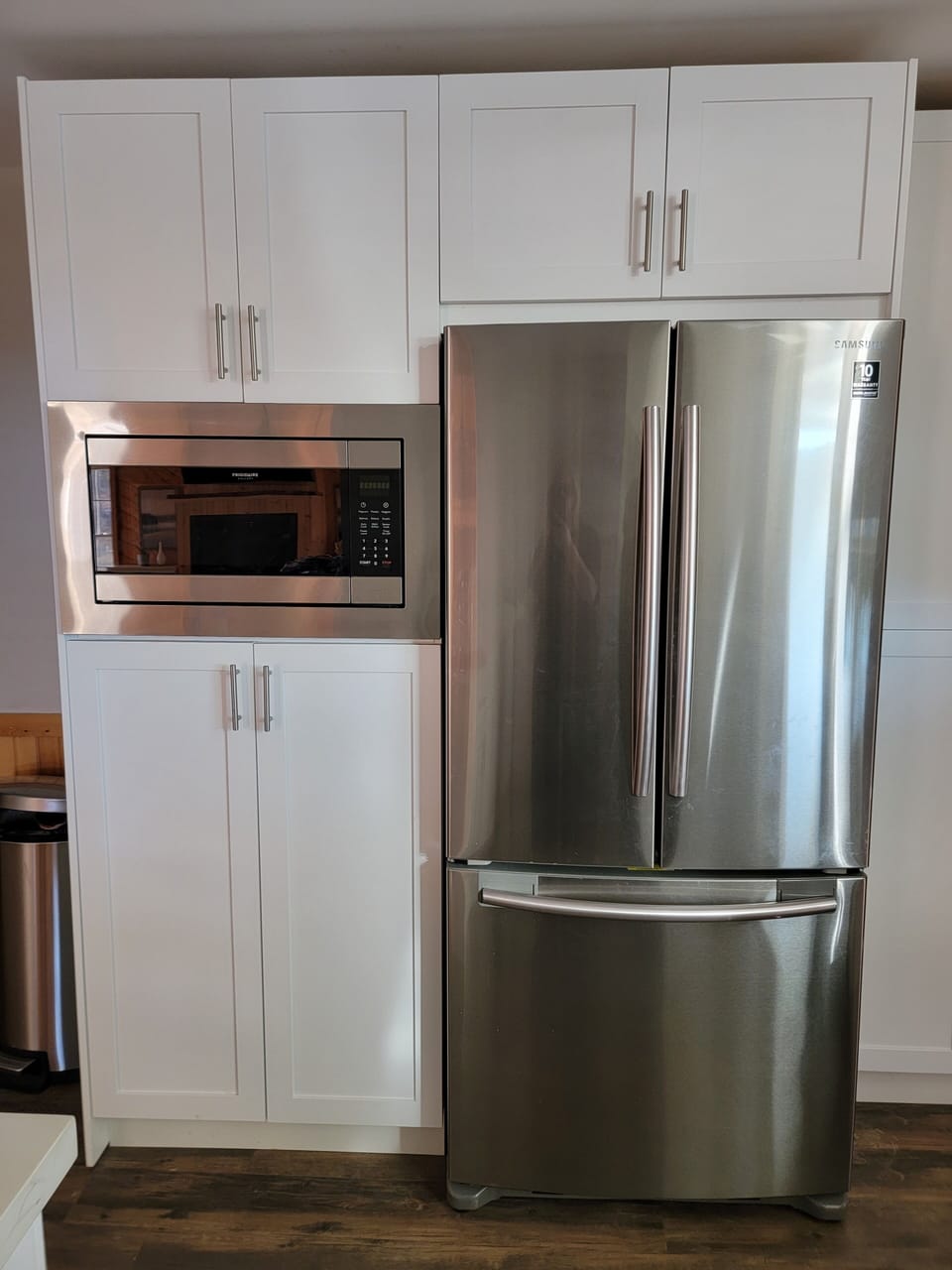 The spacious refrigerator can hold up to 18 bags of groceries (33" wide).