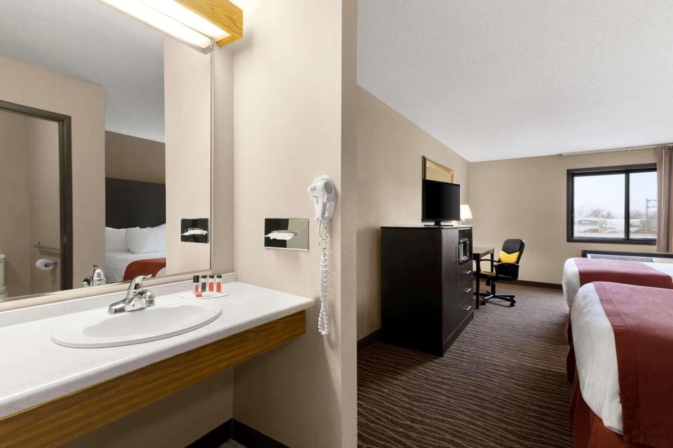 Room, 2 Queen Beds, Non Smoking | Desk, free cribs/infant beds, rollaway beds, free WiFi