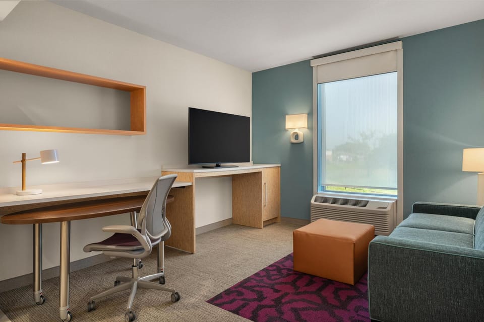 Suite, 1 Queen Bed, Accessible (Hearing) | Living area | 50-inch flat-screen TV with cable channels, TV