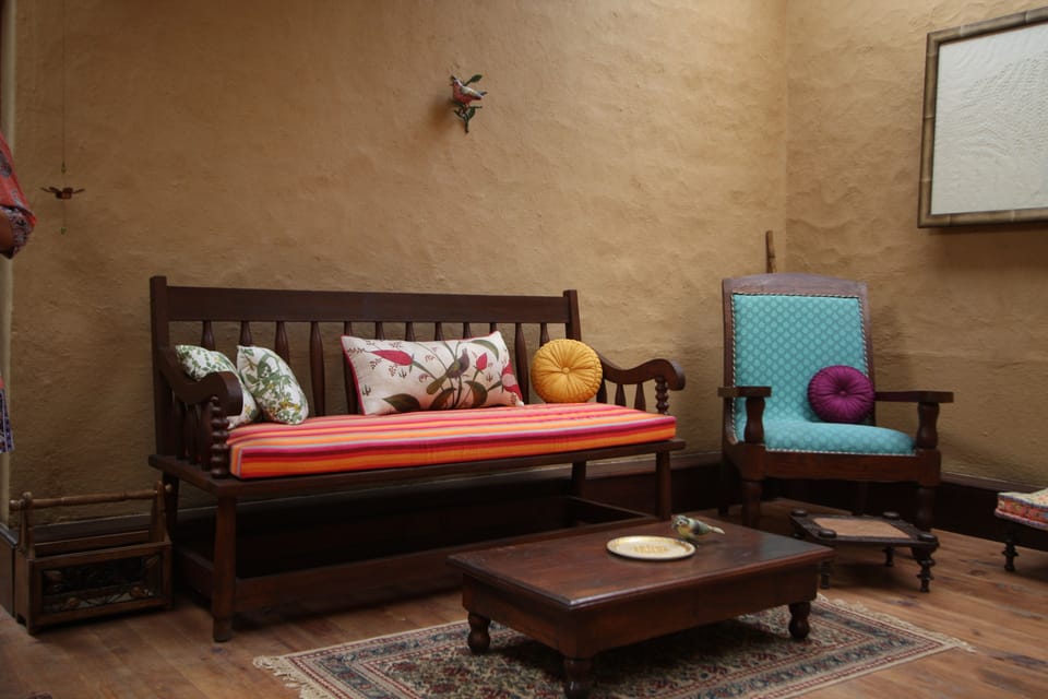 Deluxe Double Room | Living room | Flat-screen TV