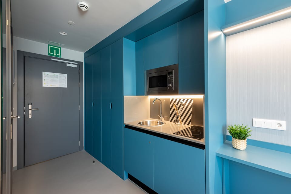 Executive Studio, 1 Double Bed | Private kitchen | Fridge, microwave