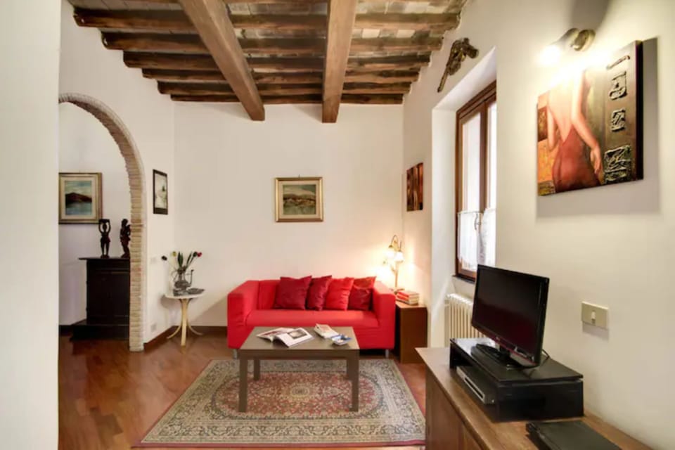 Apartment, 2 Bedrooms, Terrace, City View | Living area | TV, books