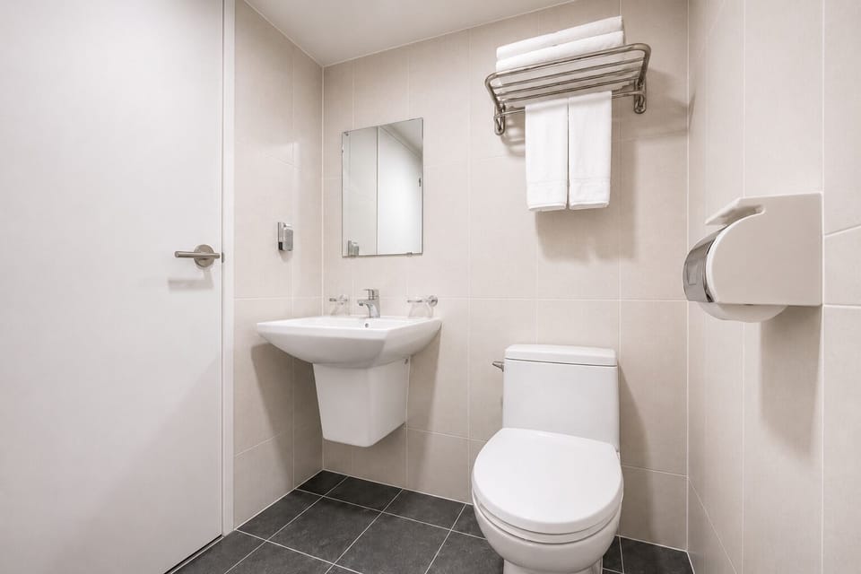 Standard Double Room | Bathroom | Shower, free toiletries, hair dryer, slippers