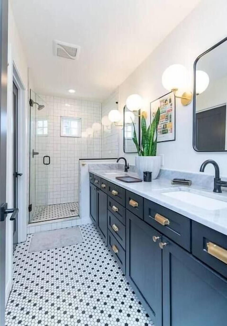 Start
your morning
under a shower
with actual
water pressure
— plenty of
counter space
for the whole
getting-ready
routine.
