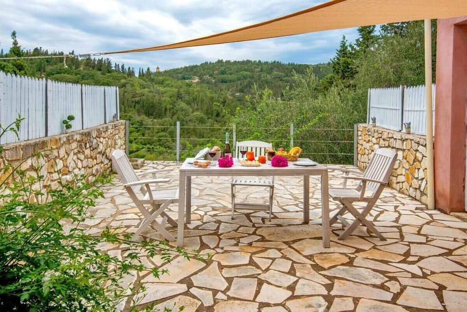 Peaceful Garden Area with Stone Details
Enjoy the beautifully landscaped garden that combines traditional stonework with Mediterranean plants.