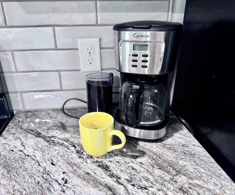 Drip coffee maker, coffee grinder and we have a French press too!