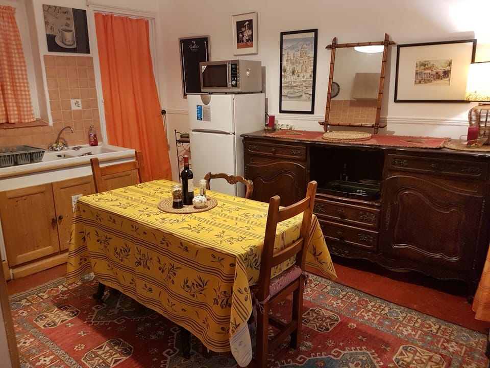 Full view of the kitchen as you walk through the apartment door. 