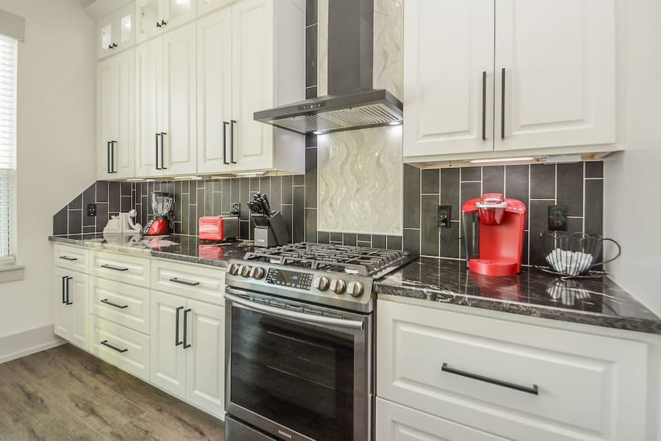 Gas range stove, keurig, blender, toaster, cutlery, baking sheets, pots and pans, all essential items, oil, salt, pepper.