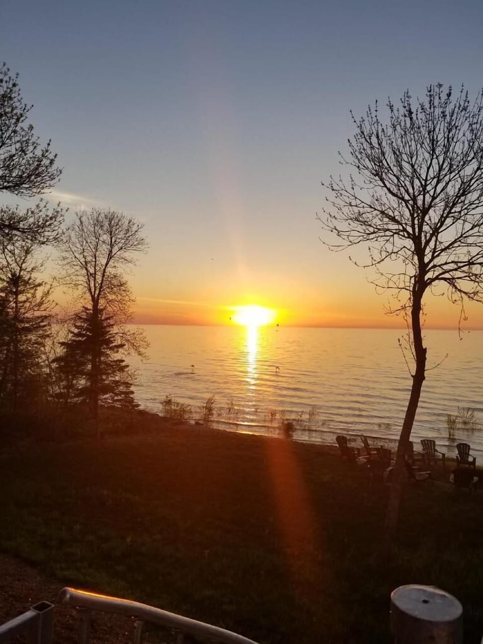 Early risers can catch a sunrise on the Lake from their bedroom or the deck