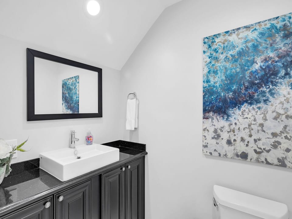 First floor powder room for your convenience.
