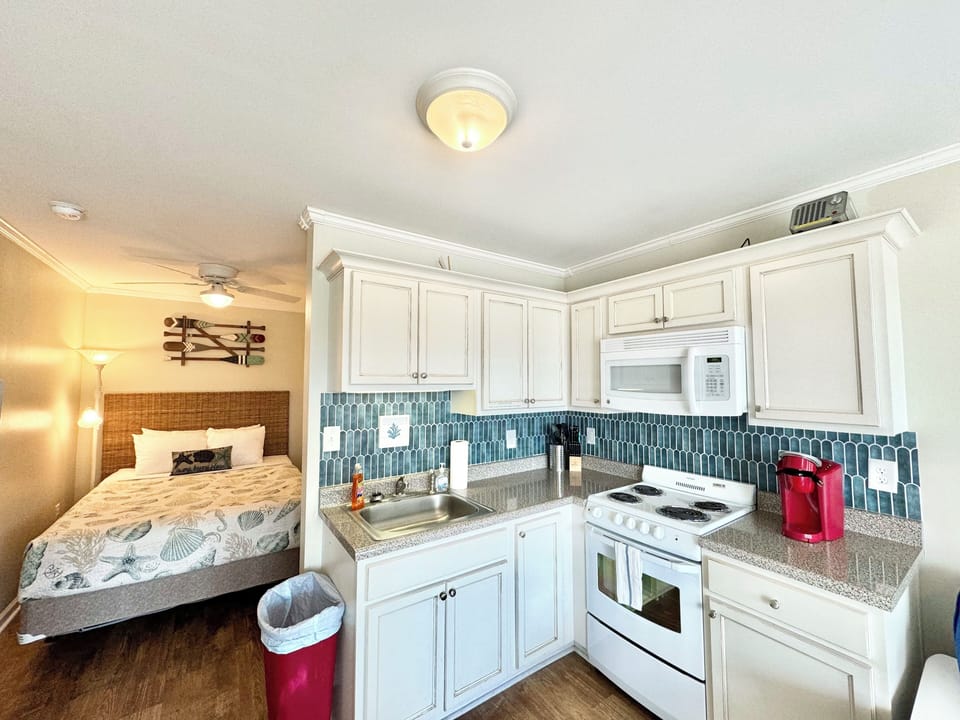 Kitchen area with basic appliances.