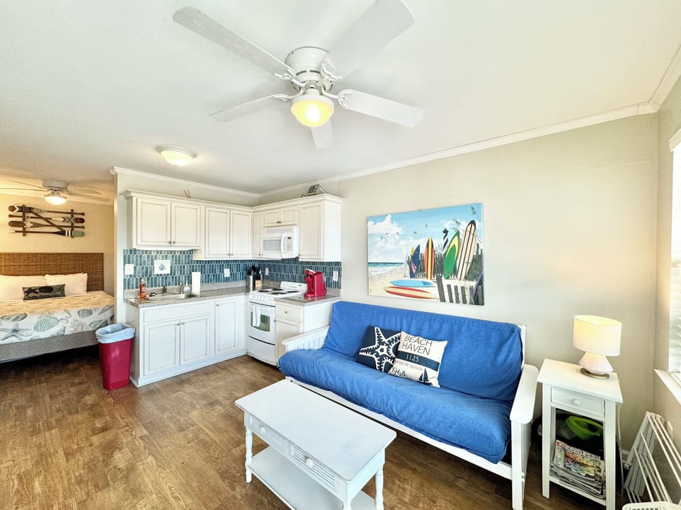 300 sqft studio unit with kitchen.