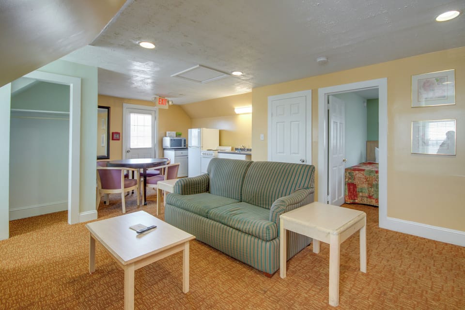 Deluxe Apartment, 1 Bedroom (1 Double, 1 Single and 2 Sleeper Sofa) | Living area | 32-inch flat-screen TV with satellite channels, TV