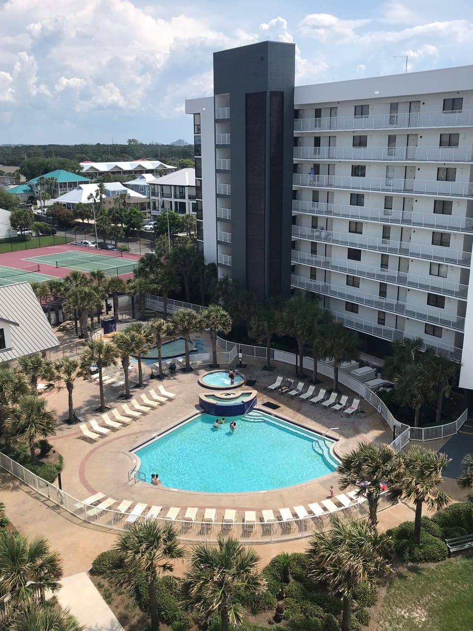 View of pool area from balcony