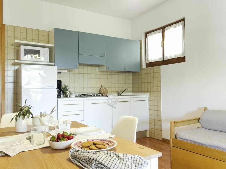 Food, Property, Cabinetry, Furniture, Table, Countertop, Window, Kitchen Stove, Wood, Kitchen