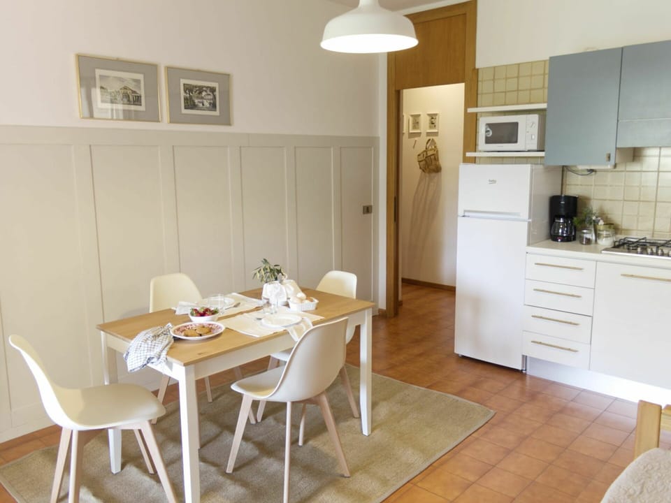 Cabinetry, Furniture, Property, Table, Countertop, Chair, Wood, Lighting, Interior Design, Kitchen Appliance