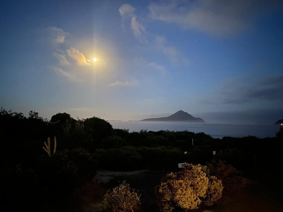 The moon rising at Yacaaba - an ever changing vista - view from bedroom
