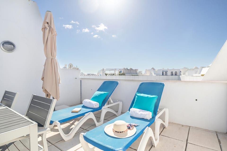 Rooftop terrace with sun loungers