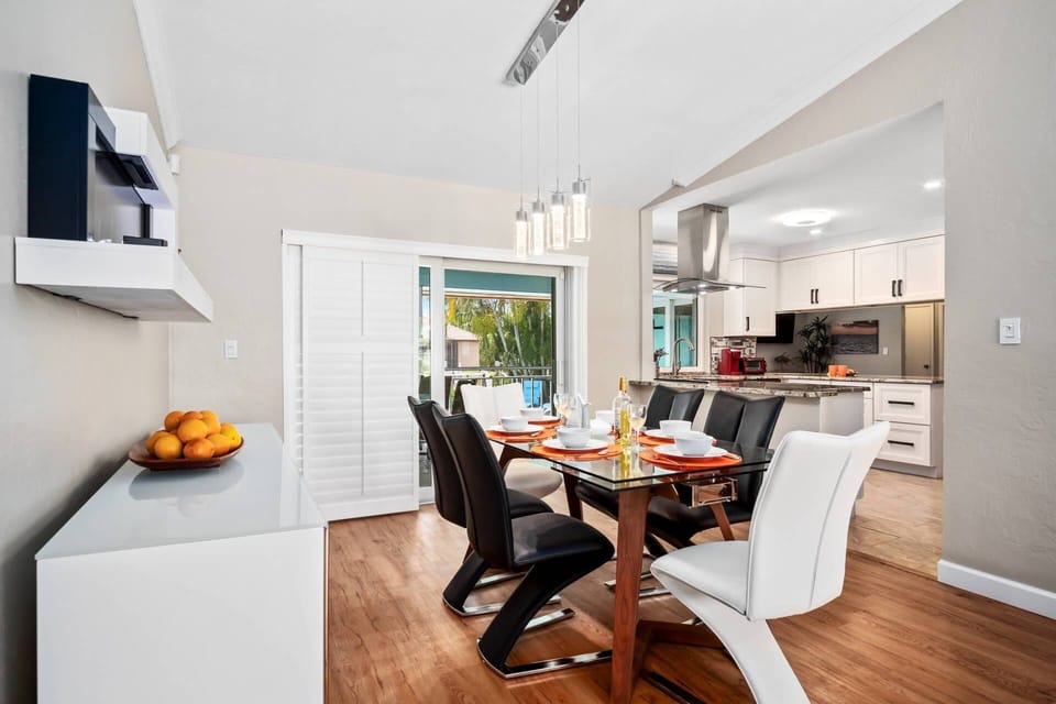 The dining room is just steps from the kitchen for dinner-service ease.