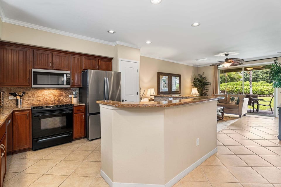 Enter to an Open Living Space Featuring Kitchen Living Room