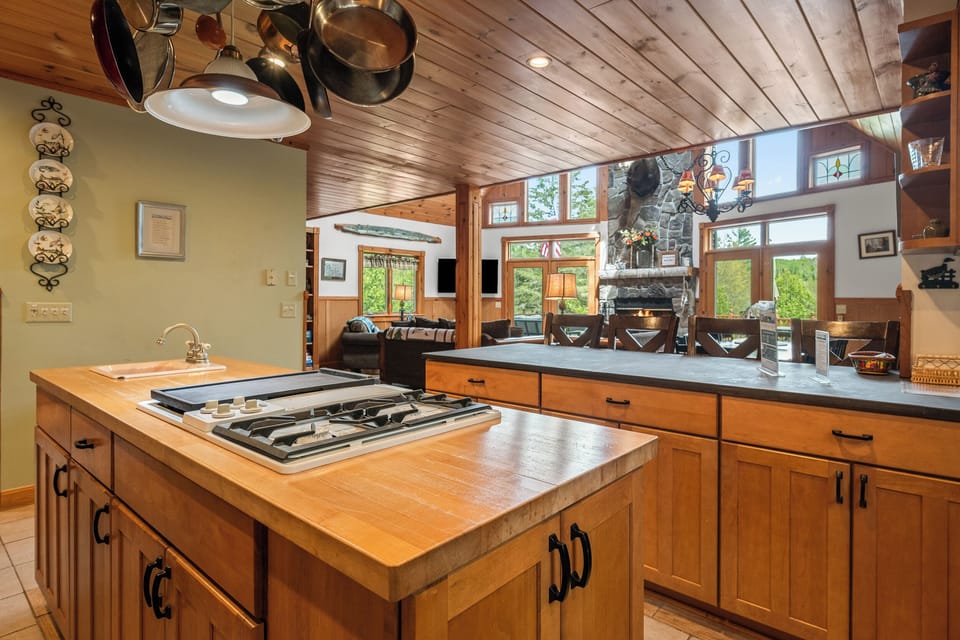 Kitchen with open views to dining and living area