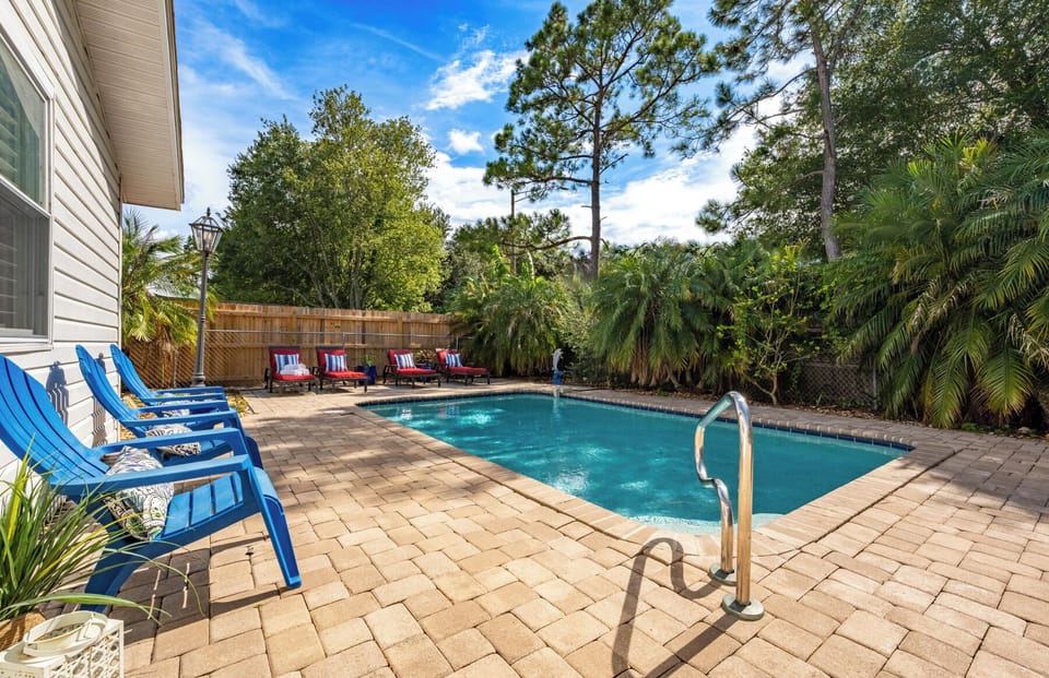 Fully fenced backyard with lush landscaping for ultimate privacy