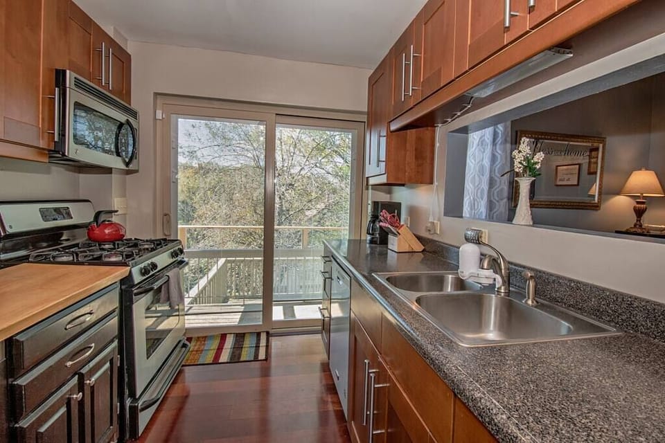 Great Galley kitchen with pass through to dining room and tons of light