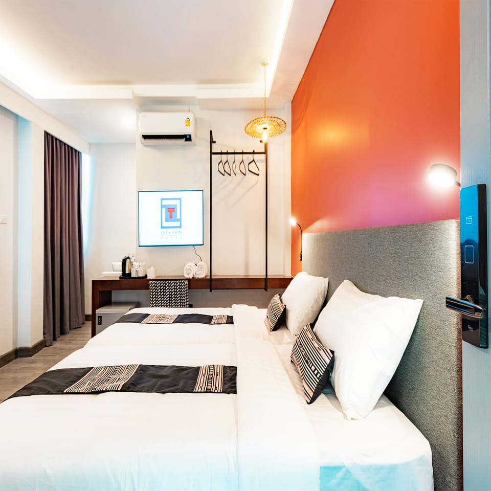 Deluxe Twin Room | In-room safe, desk, free WiFi, bed sheets