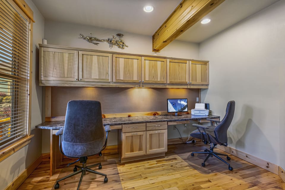 Large two desk office with monitor and printer allowing you to work remote