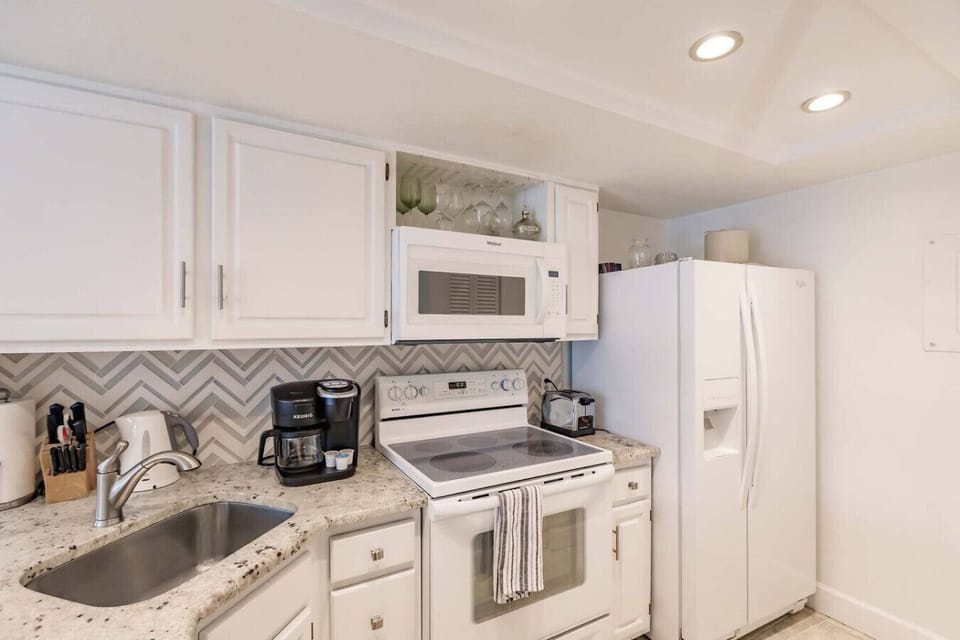 Fully equipped kitchen. Coffee maker is a duo, so it does coffee pot & pods. You can also see in the photo, there is a kettle for tea drinkers.