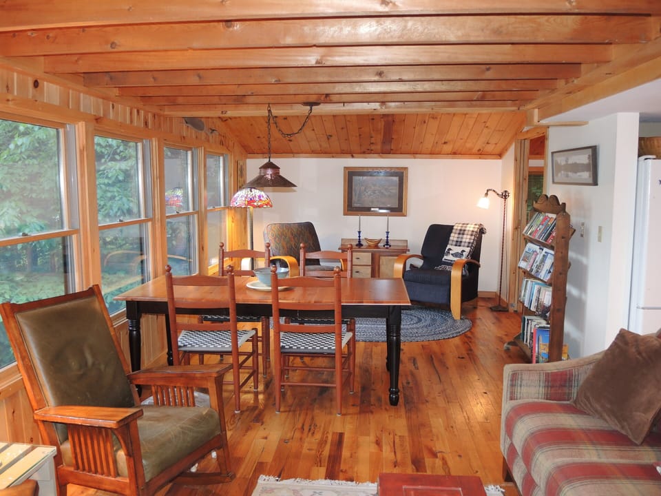 Living + dining overlooking water