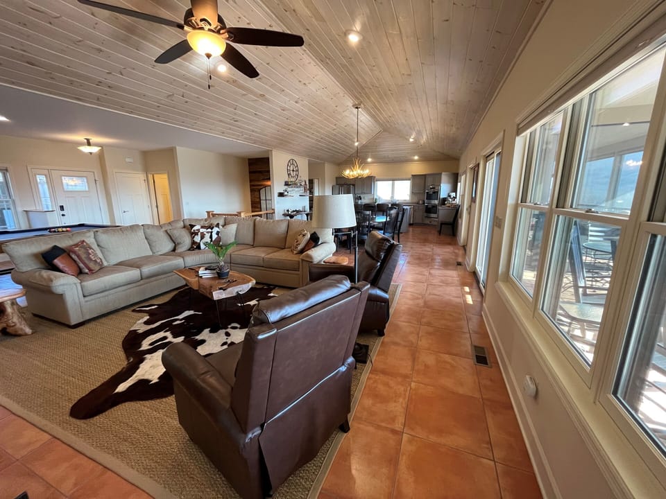 Cozy up to the fire, watch a movie, have a chat or just enjoy the mountain views