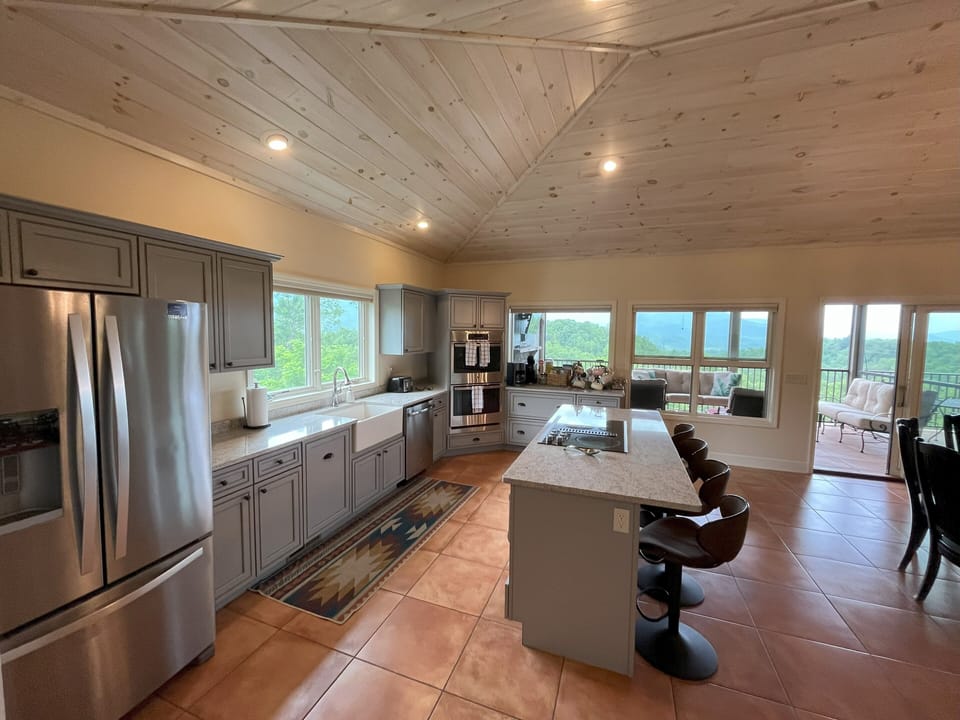 The kitchen is well stocked: spice cabinet, baking dishes, 2nd fridge in garage