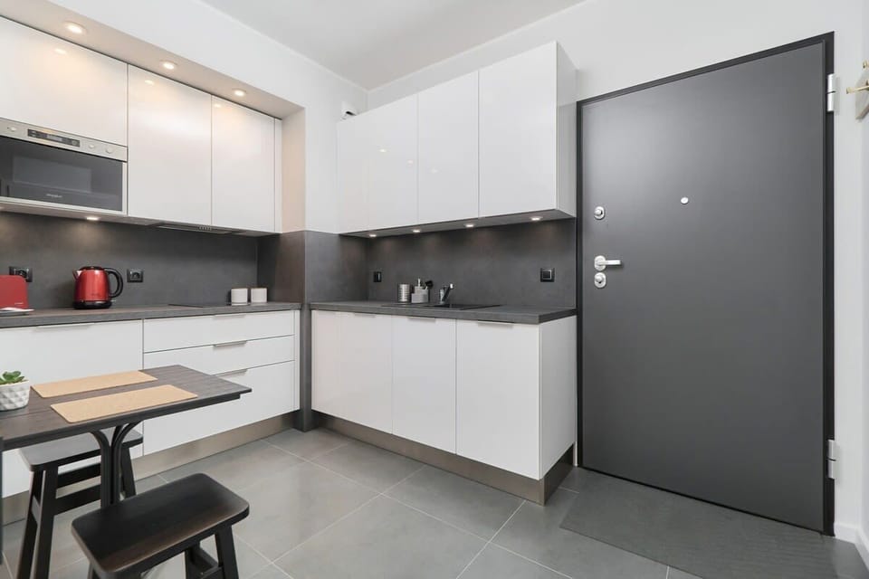 The kitchen's practical layout maximizes space and functionality.